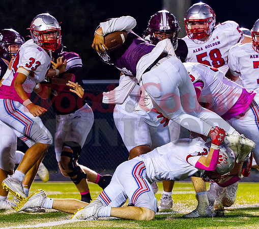_A251623 Bret Sutton upends ballcarrier