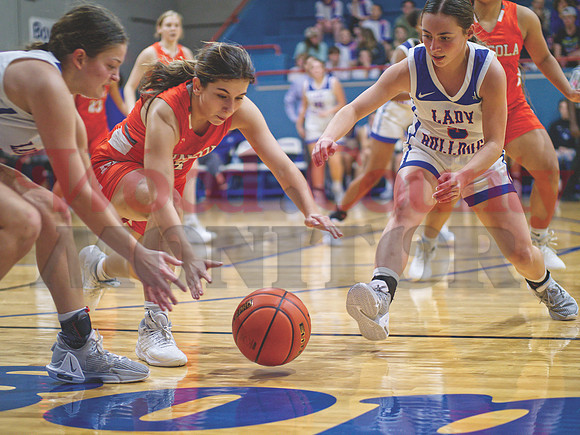 _1218192 Madyson Pence and Addison Marcee battle Carmen Carrasco for loose ball