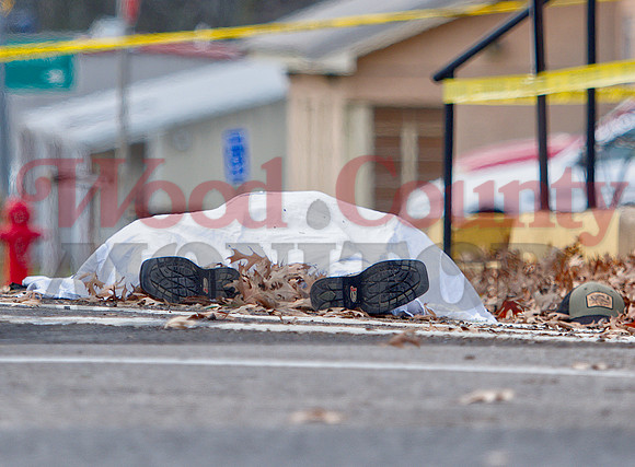 _1398037 shooting victim wore boots and hat