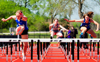 _1136730 Savana Smith and Gracie Linley and Bonnie Vander Schaaf run 100m hurdles