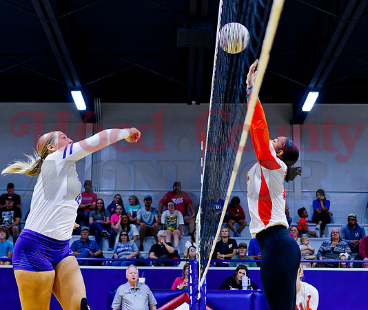 _1270009 Annabell Popek hits over Kyra Jackson