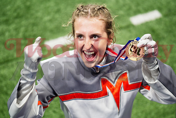 _1004170 Maddie Tucker shows gold