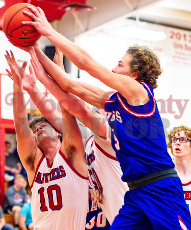 _1015453 Blake Weissert 10 and Gavin Dailey 50 battle Thomas Sebedra 30 and Brady Floyd 5 for rebound