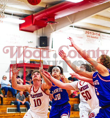 _1015452 Blake Weissert 10 and Gavin Dailey 50 battle Thomas Sebedra 30 and Brady Floyd 5 for rebound