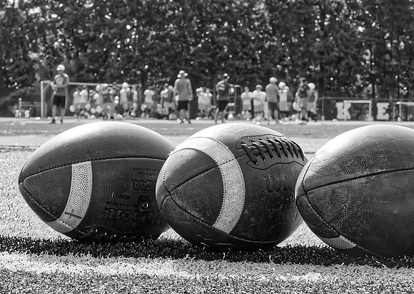_1063292 mineola football water break abstract