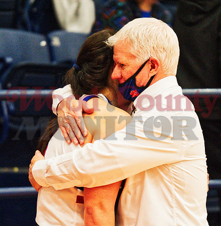 _1183456 coach Dale Clement embraces Kalli Wright