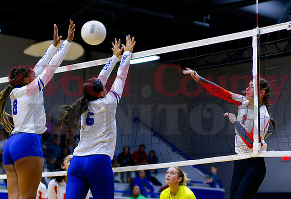 _1289976 Mahayla McMahon hits to Allie Berry and Kaylin Sapp