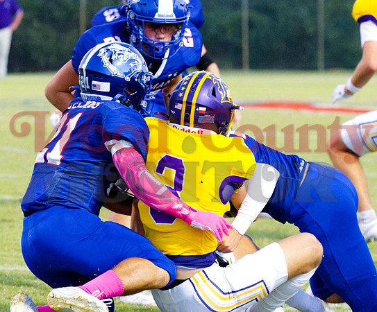 _A040476 Preston Flores assists tackle