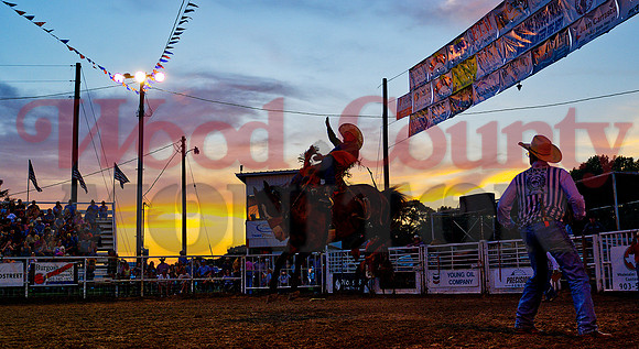 _1204021 bronc ride at sunset