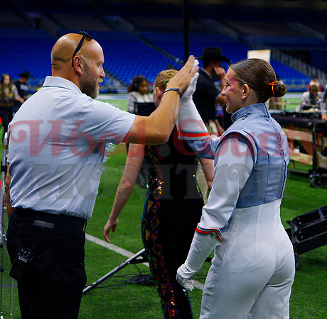 _1397991 Jim Best hi-fives Audria Bynum after finals