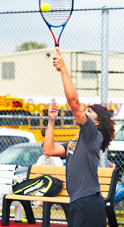 _1113822 Mario Bautista serves